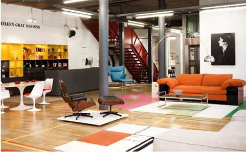 Studio living space with sports court wood floor