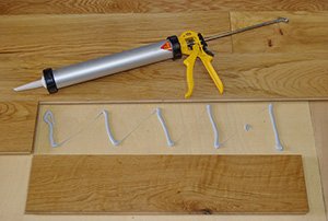 Failure of Adhesion on Bonded Floors